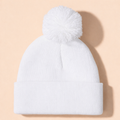 Gorro con pompones de infantil